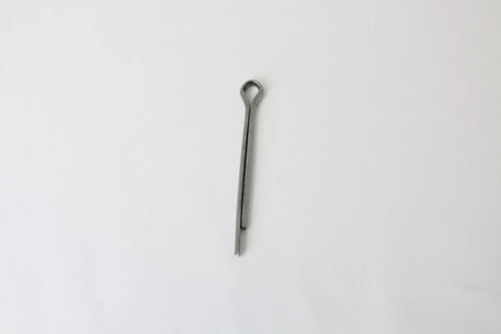 Single cotter pin placed on a white background.
