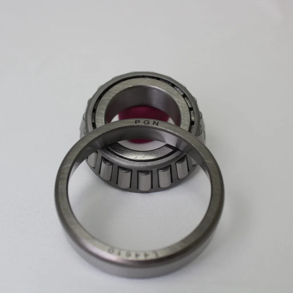 PGN tapered roller bearing set standing upright with cup and cone components