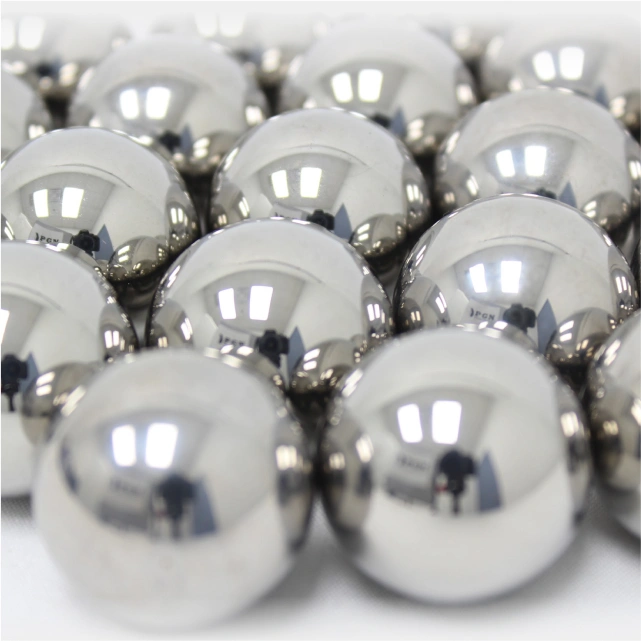 Close-up of polished steel bearing balls arranged tightly together.